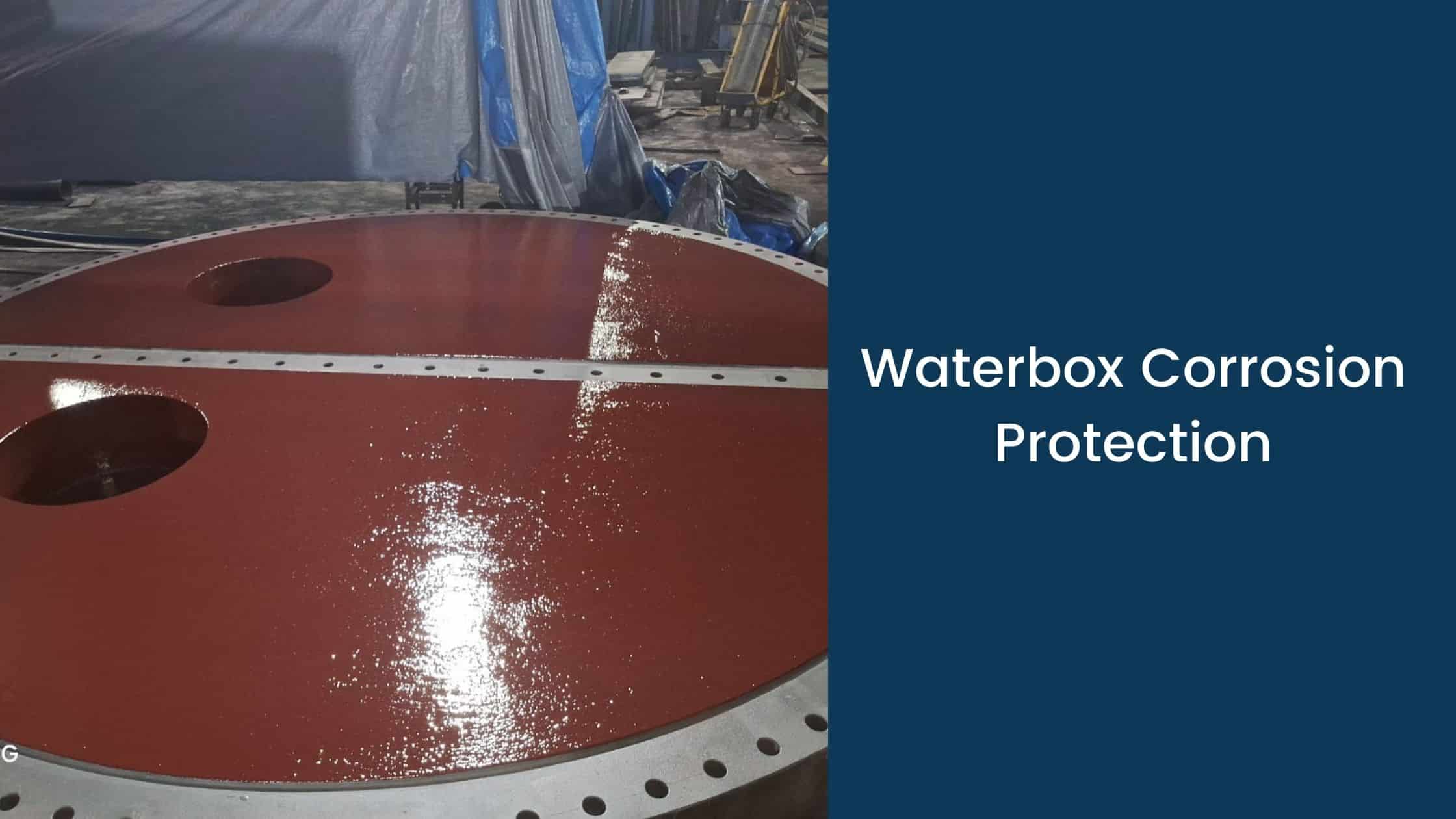 Waterbox end cap with freshly applied red epoxy coating for marine corrosion protection